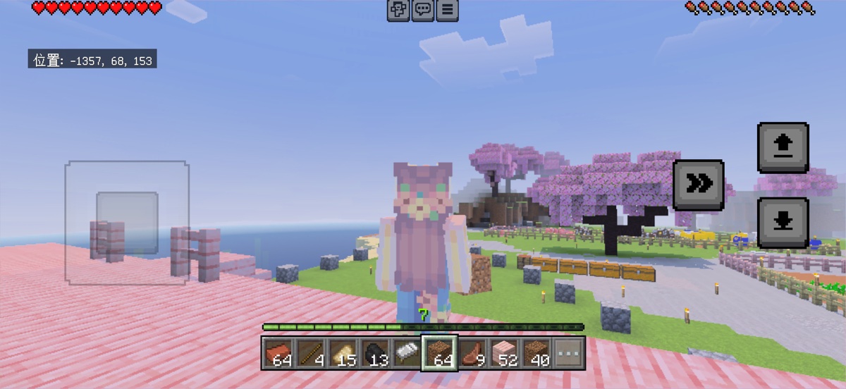 マインクラフトで桜の街に家を建てているプレイ画面(Let's build a house!の場面)